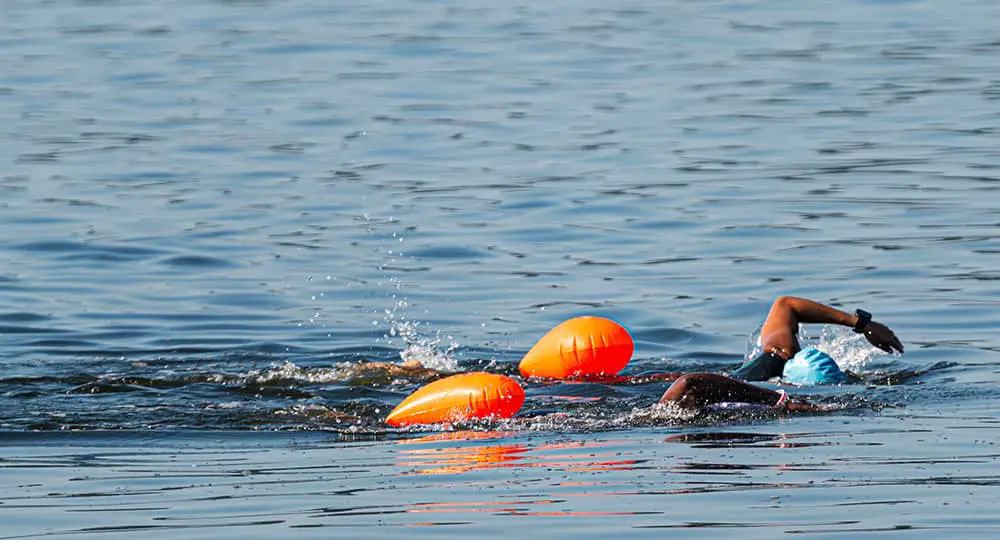 group swimming in cold water